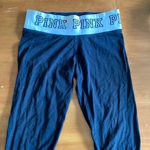 Black leggings with white waistband.